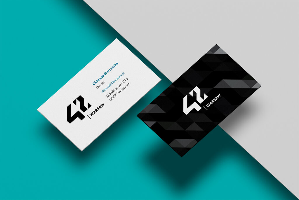 42 Warsaw business cards in white and black on a teal background