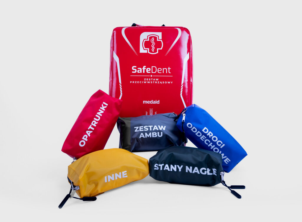 Red SafeDent first-aid backpack with colour-coded pouches