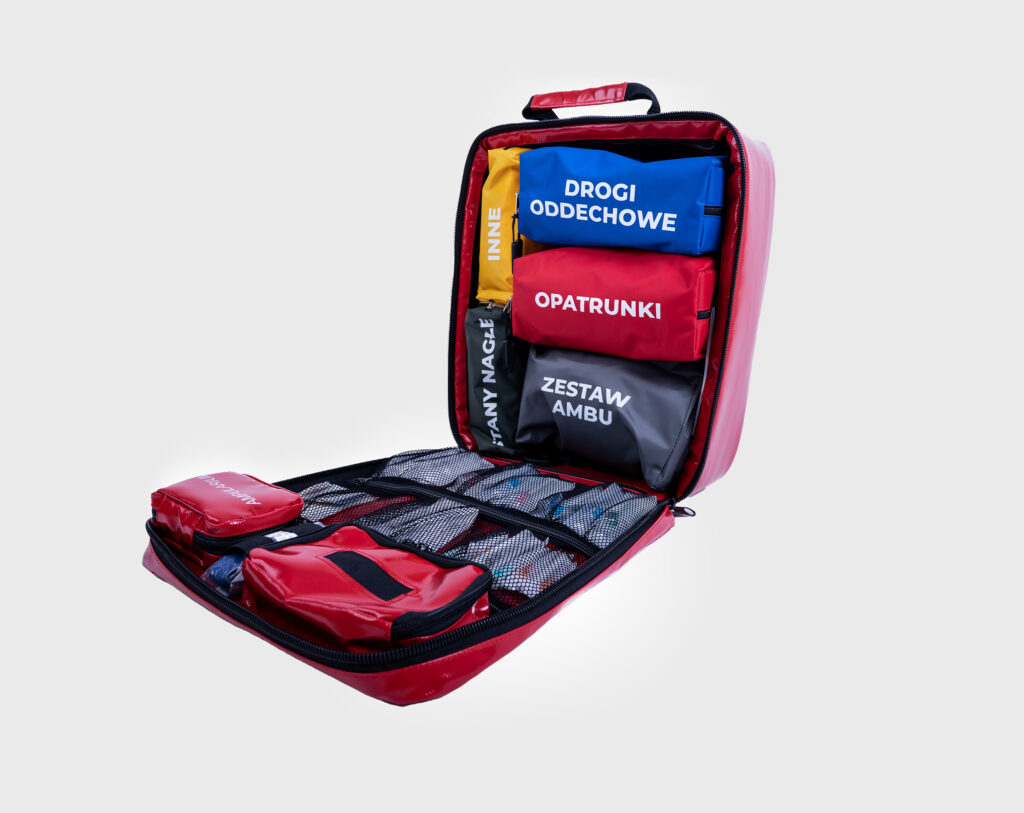 Open Medaid first-aid bag with labelled pouches inside