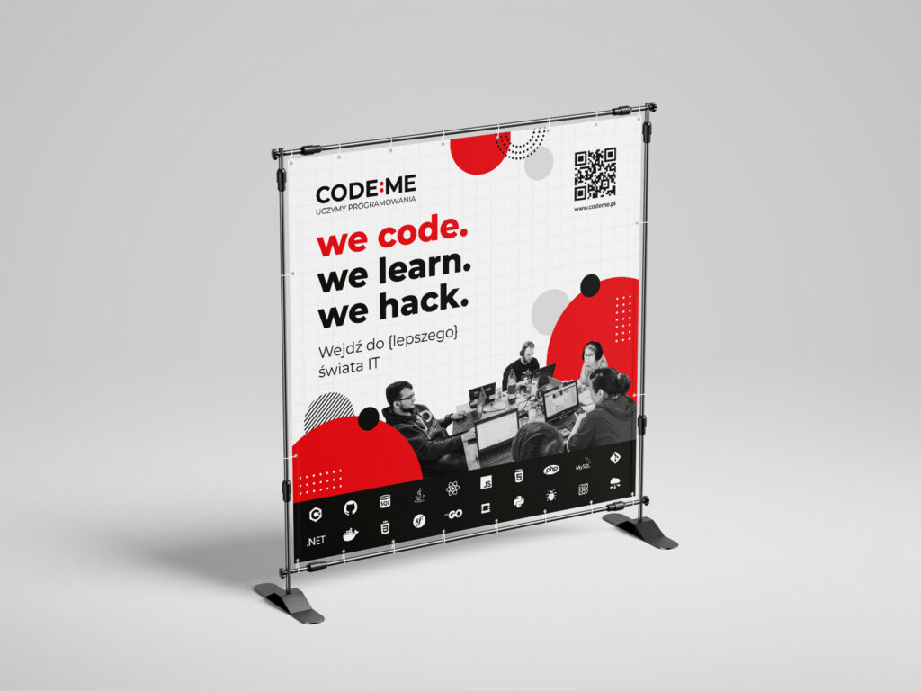 CODE:ME "we code. we learn. we hack." banner on a frame