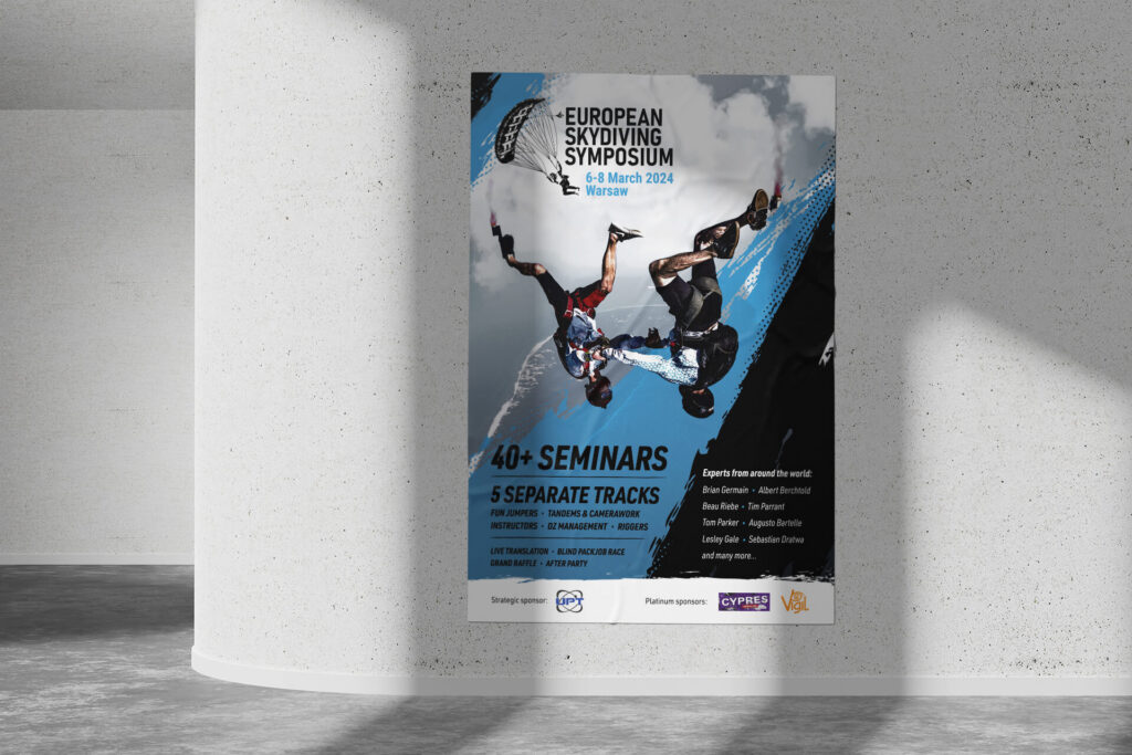 European Skydiving Symposium poster with skydivers on a concrete wall