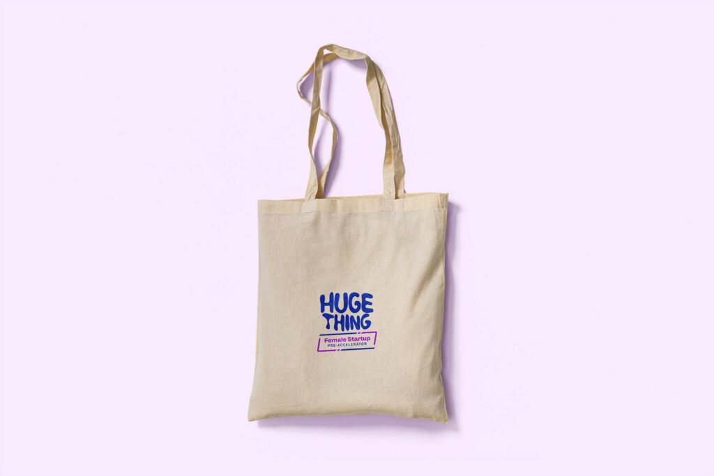 Canvas tote bag with the Huge Thing Female Startup Pre-Accelerator logo