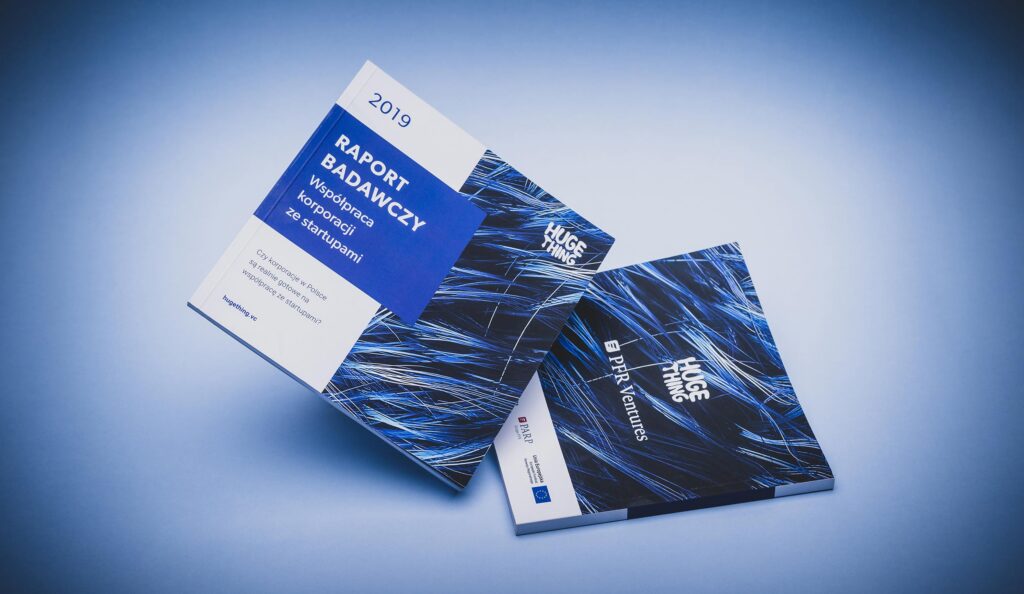 Huge Thing research reports with blue abstract covers
