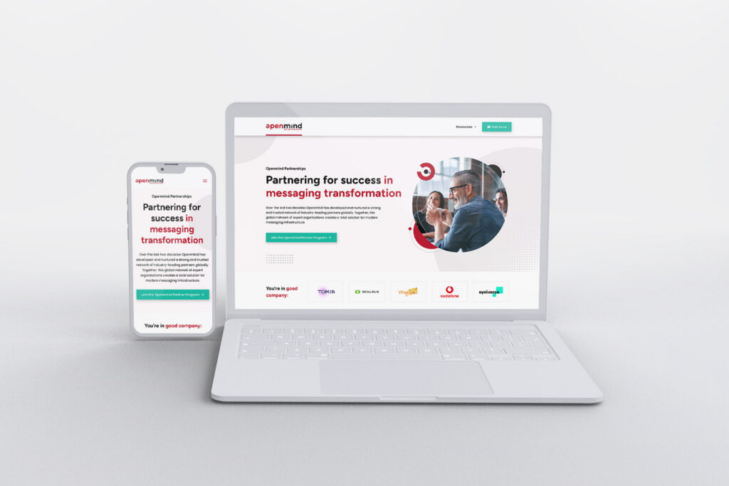 Openmind Networks website on a laptop and a smartphone