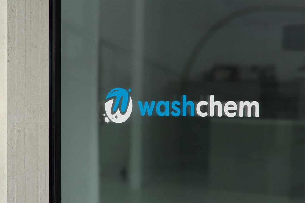Washchem logo on a glass door