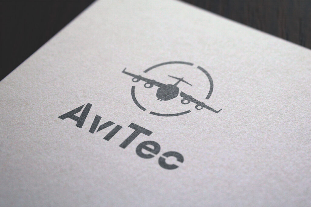 Avitec logo embossed on textured paper