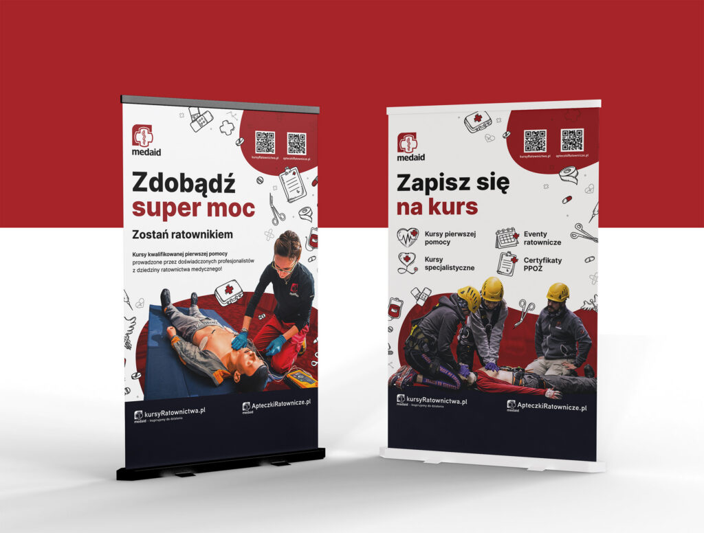 Two kursyRatownictwa.pl roll-up banners promoting first-aid courses
