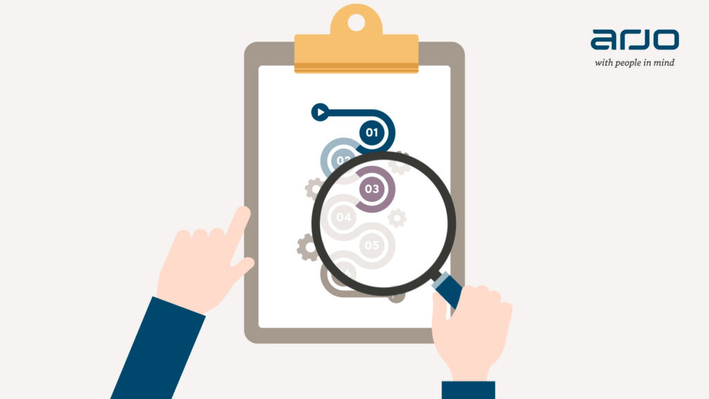 Animation frame: hands holding a clipboard with a magnifying glass, Arjo