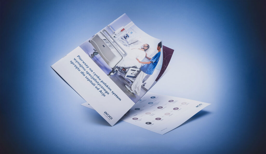 Arjo leaflet on a blue background