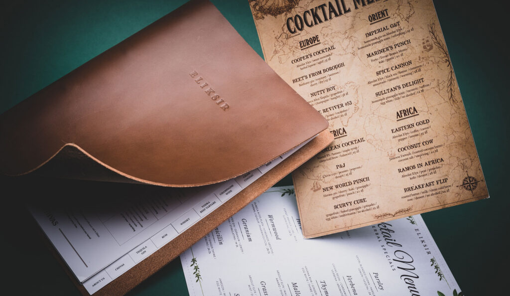 Eliksir cocktail menu in a leather cover