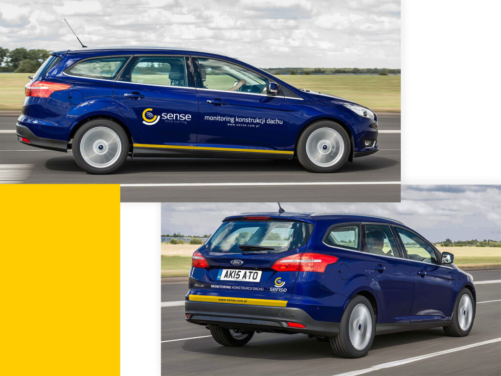 Navy company car branded with the Sense logo, side and rear view