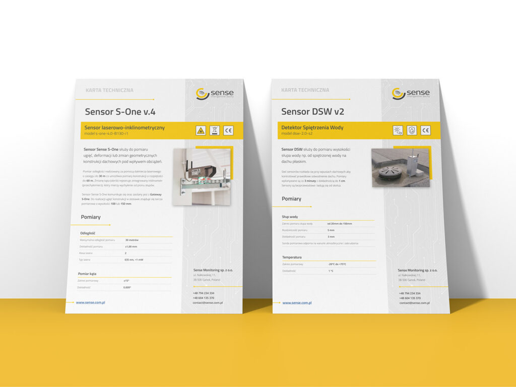 Two Sense sensor data sheets standing on a yellow surface