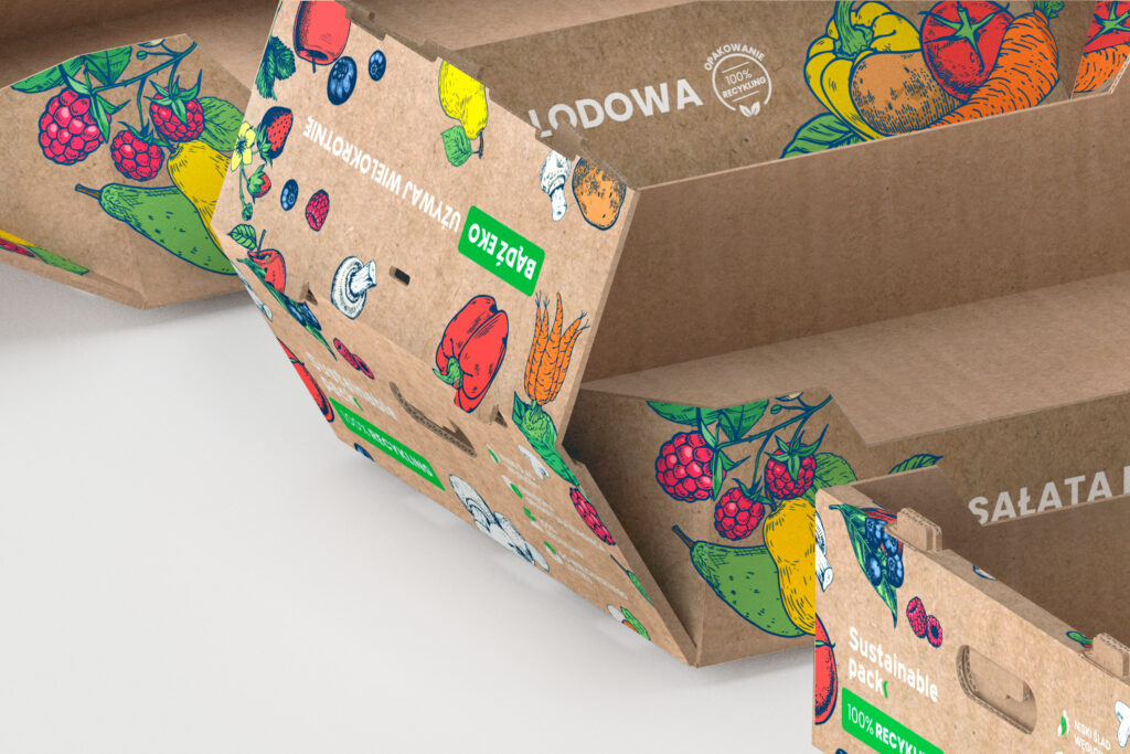 Close-up of cardboard trays printed with colourful fruit and vegetables