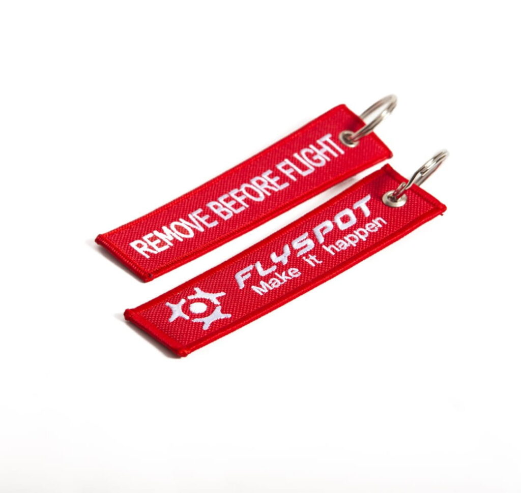 Red Flyspot "Remove before flight" key tags